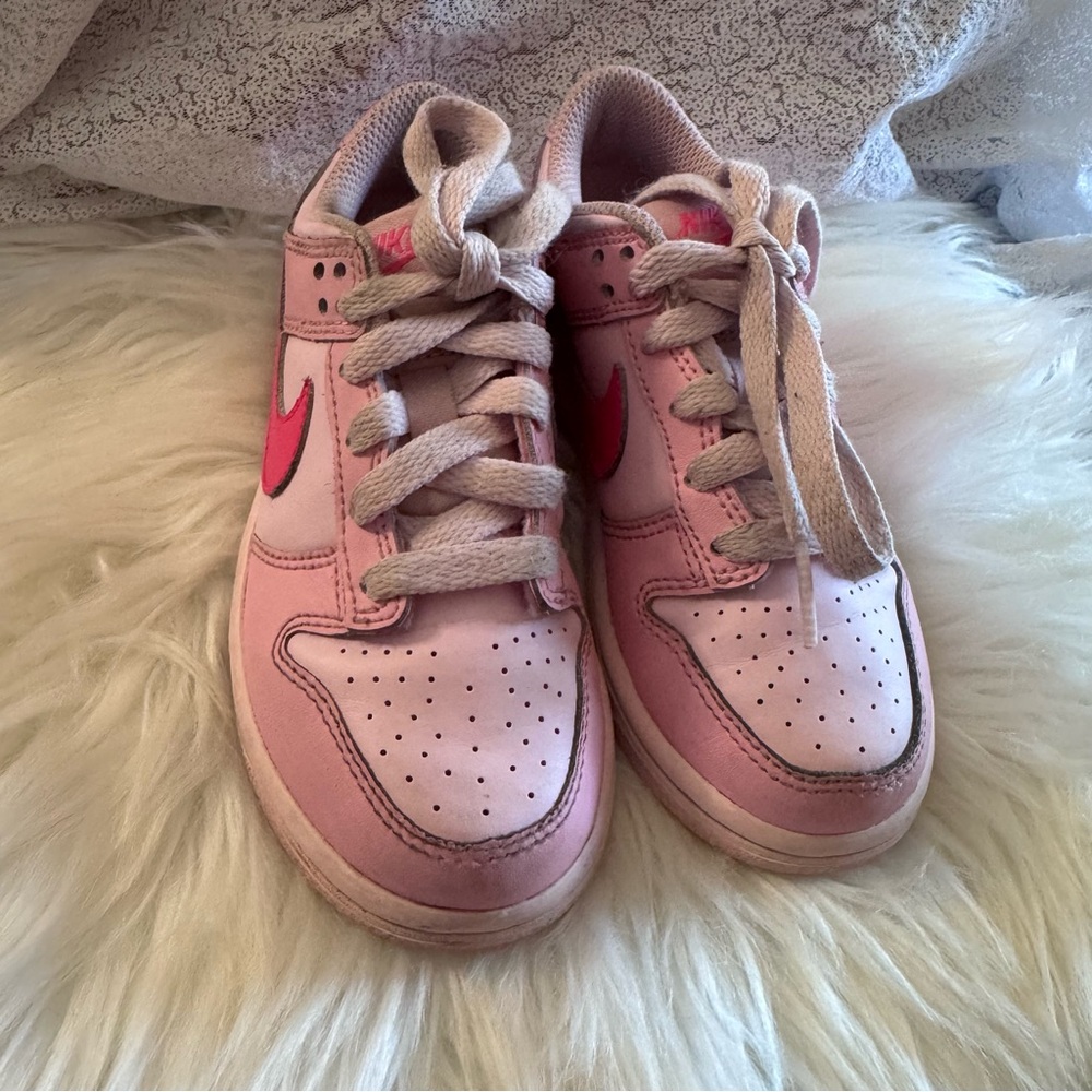 Nike Pink Sneakers with White Laces and Perforated Details